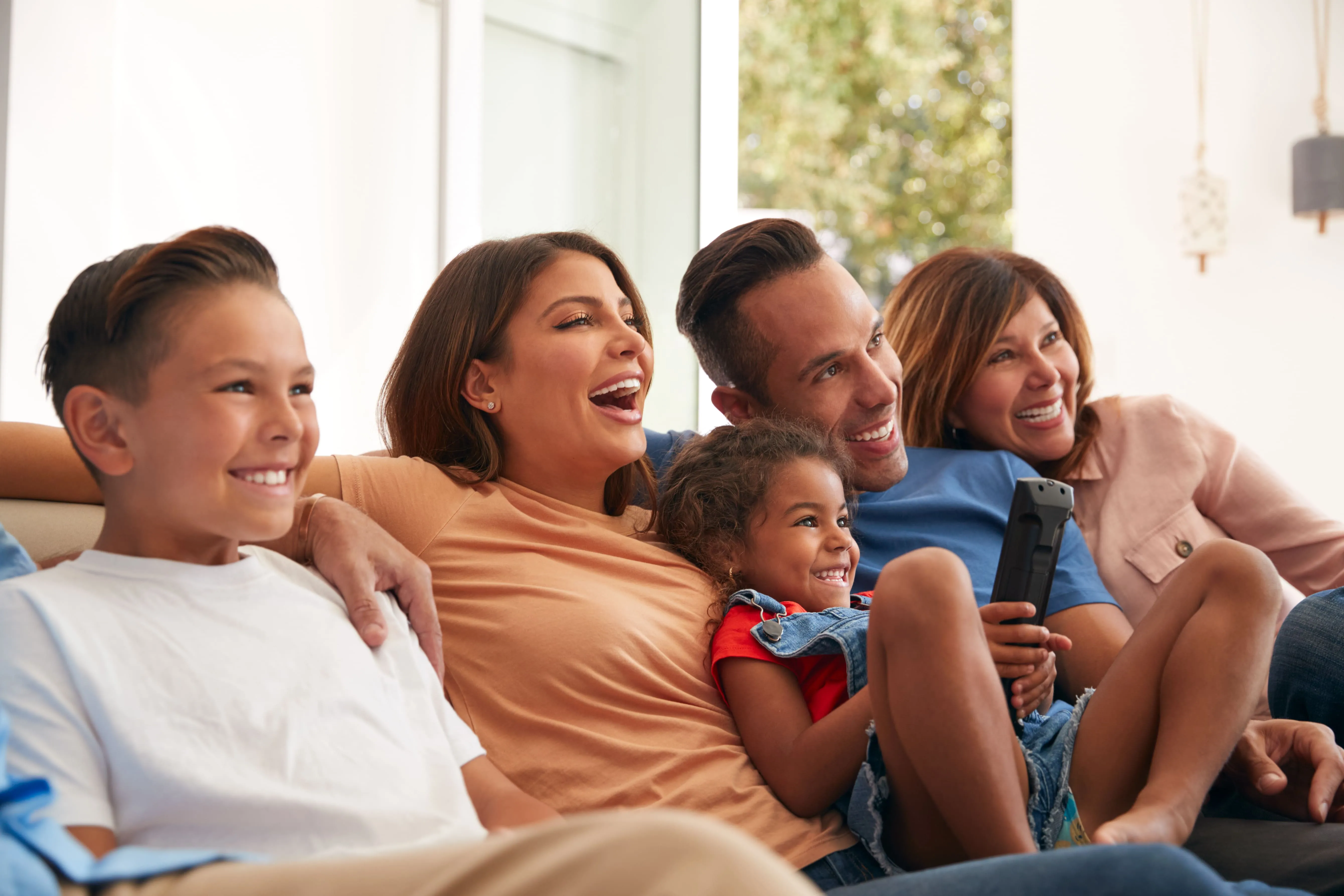 Picture of a family enjoying TV